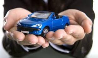 Toy car in hands